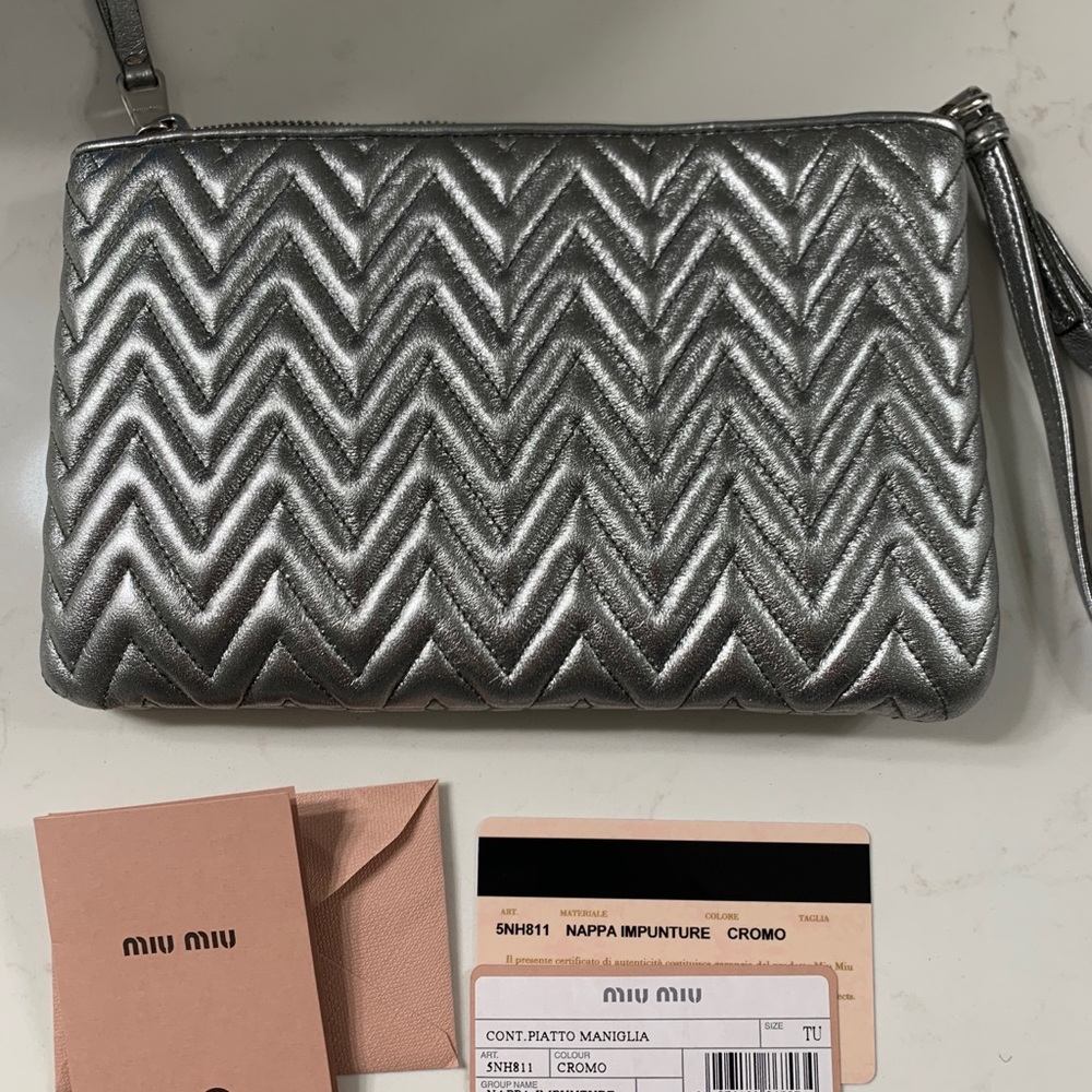 Miu Miu chrome wristlet